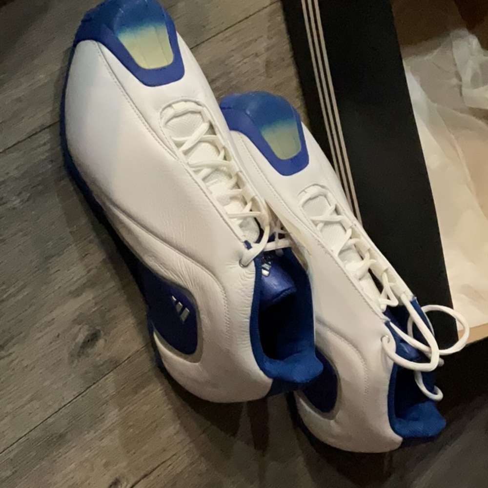 White and Blue Athletic Shoes